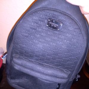 Black male micheal kors backpack